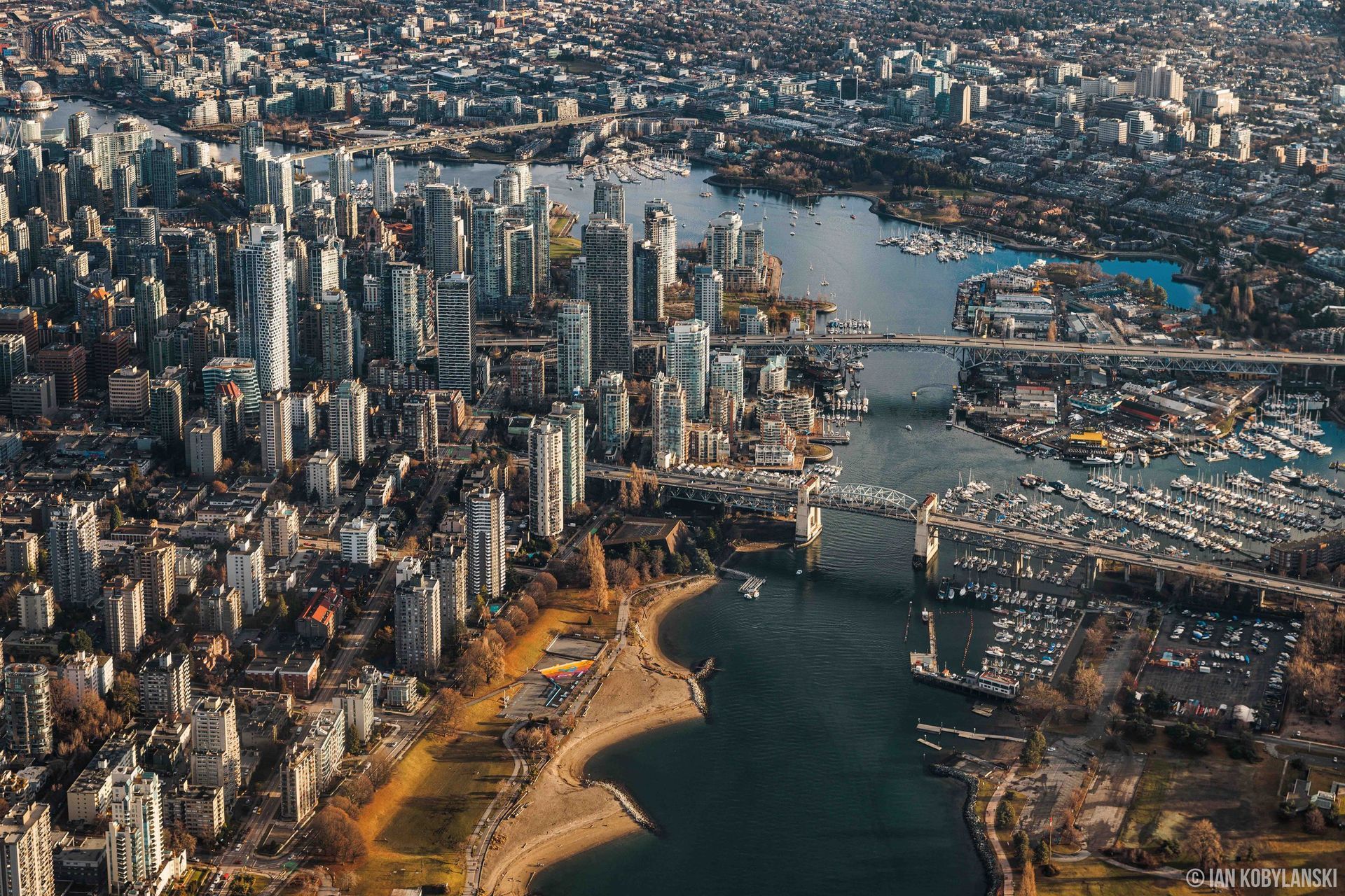 An aerial view of a city with a river running through it