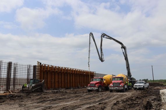 A concrete pump is being used on a construction site