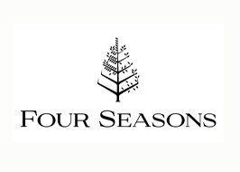 The four seasons logo is a black and white image of a tree.