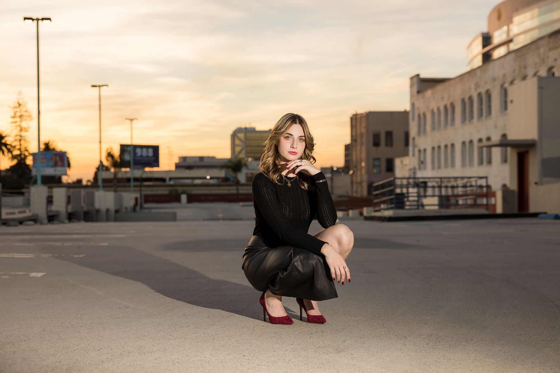 Sunset portrait of a senior on a rooftop in Santa Ana Art District