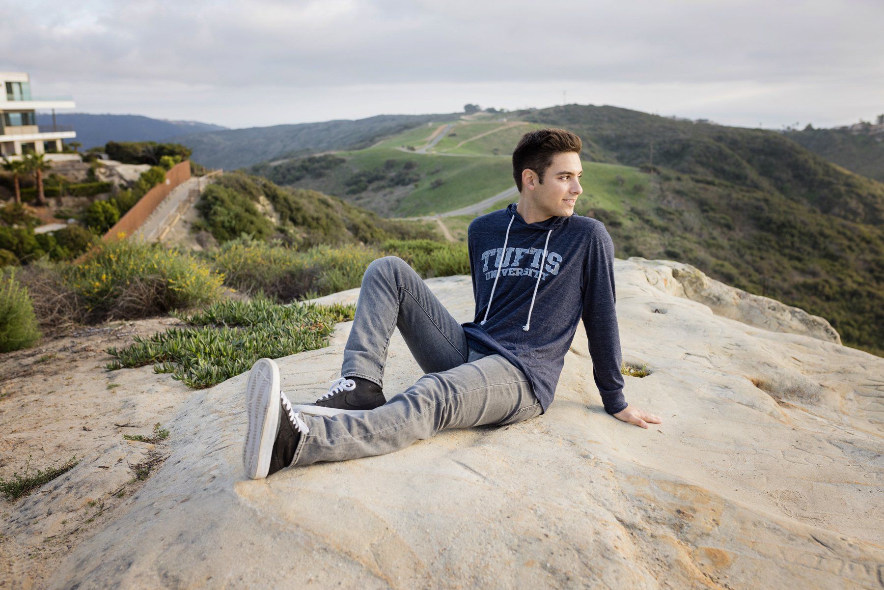 High School Senior portraits in College gear at Top of the World in Laguna Beach California