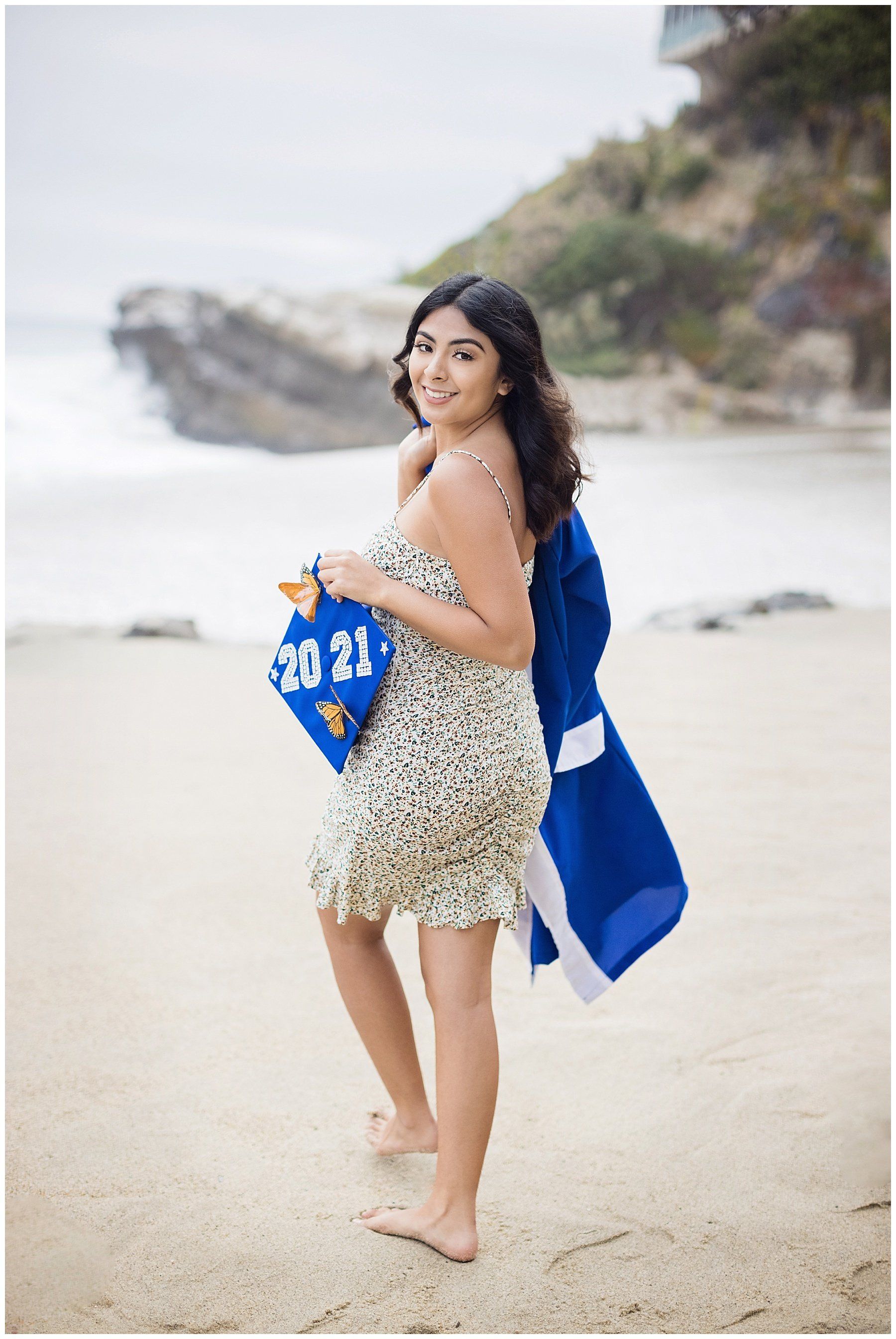 Cap and gown senior portraits at Tablerock beach in Laguna Beach