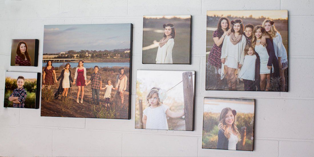 A group of pictures are hanging on a wall.