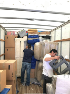 Movers packing truck