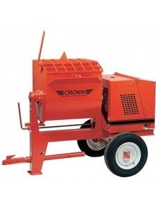 A person holding a baby up in the air indoors near a window, baby smiling.