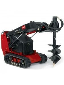 A person holding a baby up in the air indoors near a window, baby smiling.