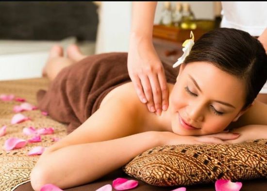 woman getting a relaxing back massage