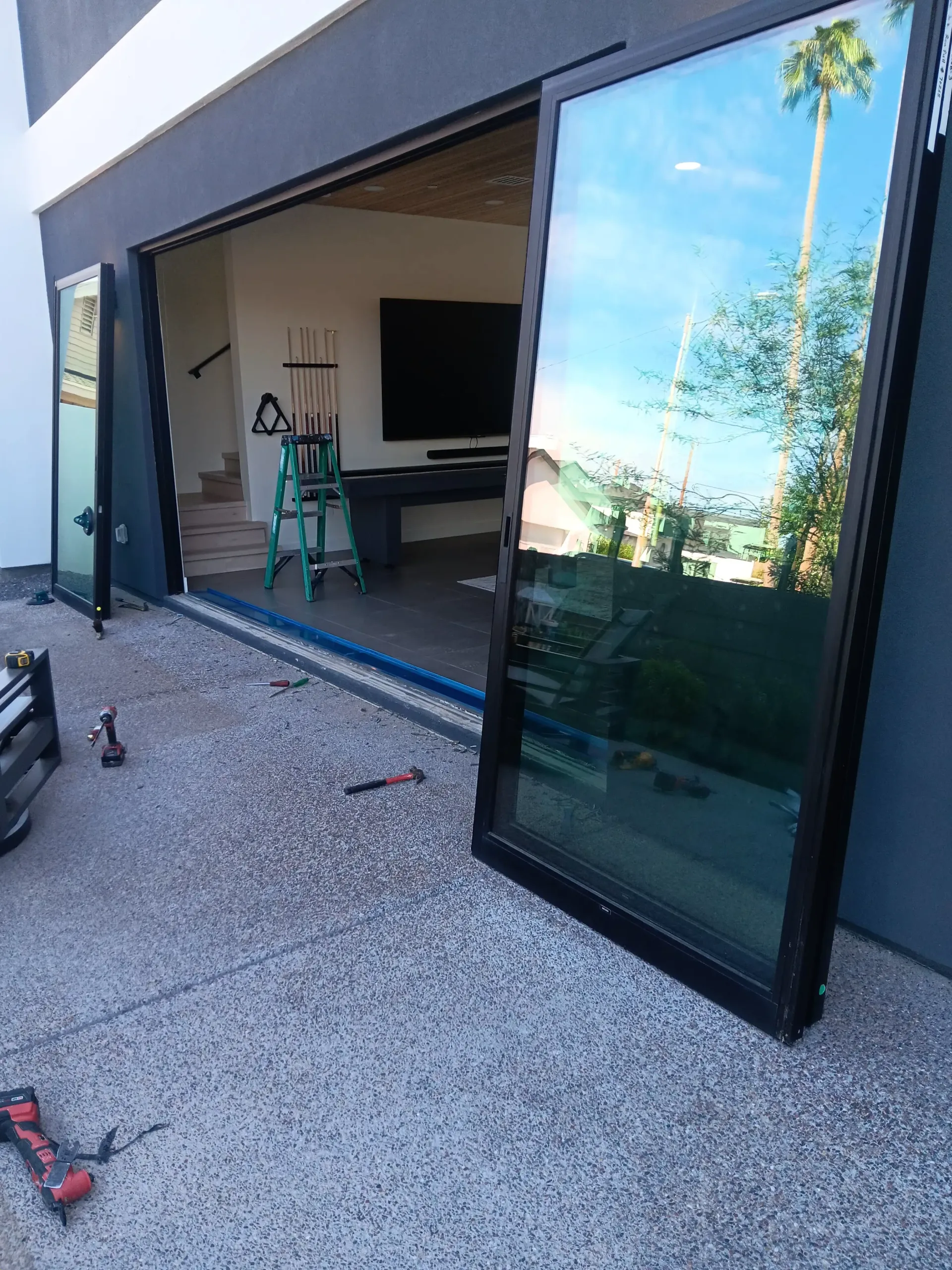 Installing wide sliding patio door opening in Phoenix remodel