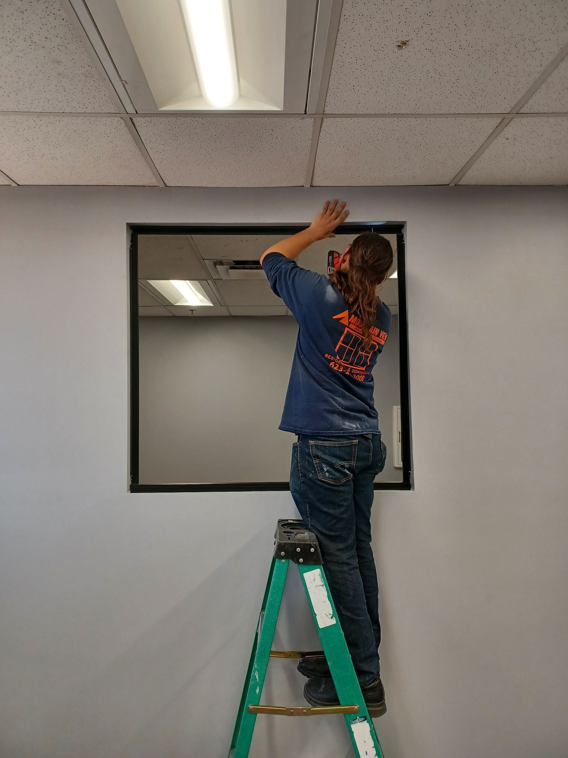 Replacement window crew upgrading outdated aluminum windows in Mesa