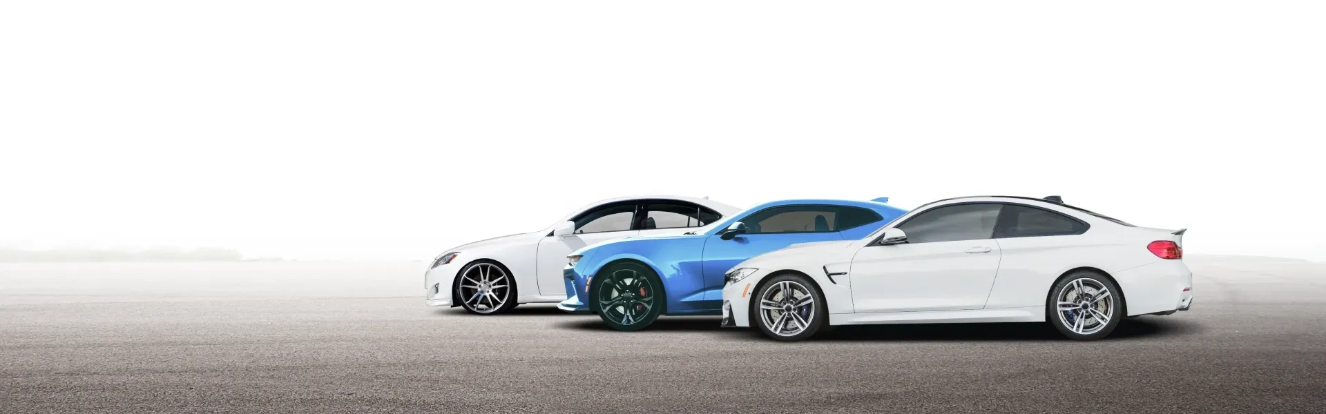 Two white cars and one blue car parked on cement with white background | Hometown Tire & Service