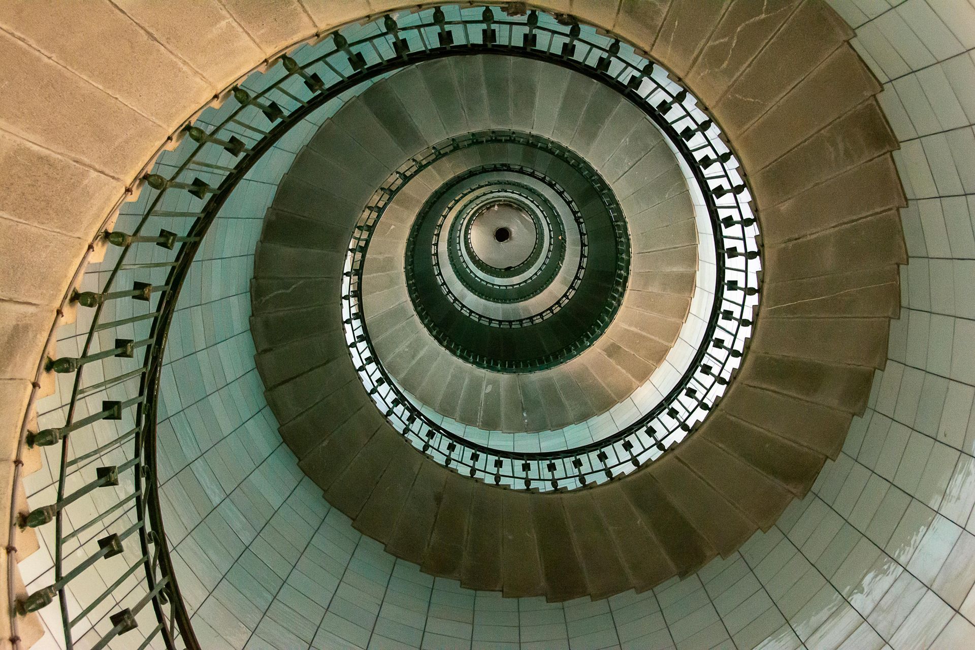 spiral staircase symbolizing repeating life patterns and deeper soul evolution