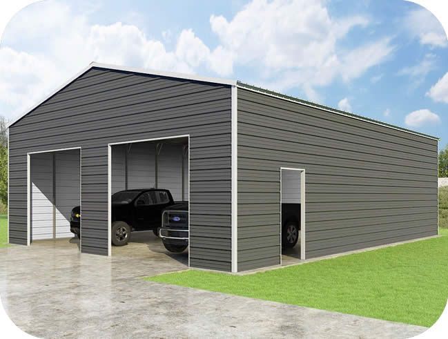 A truck is parked in a double garage supplied by metalbuilt.ca