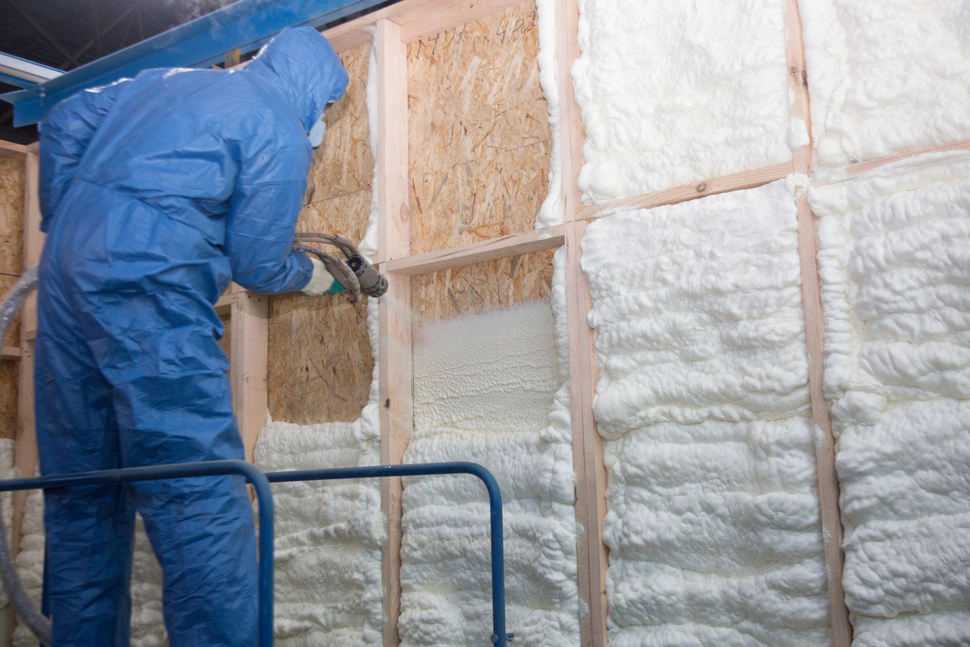 Spray Foam Insulation Contractor adding foam into walls in Burlington, VT home