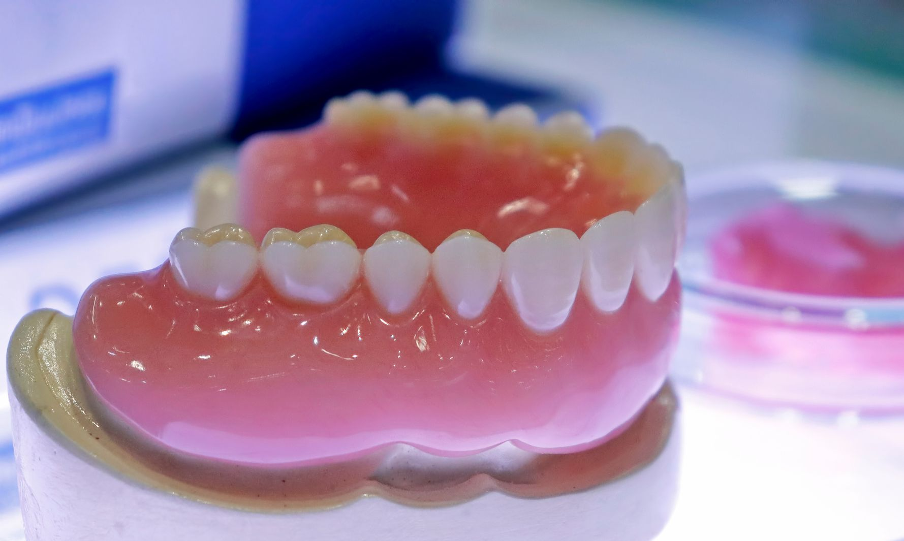 A close up of a denture on a table.