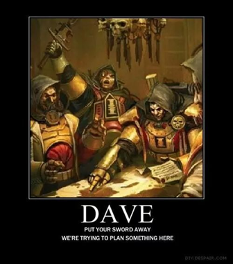 Men in hoods and armor around a table; one holds a sword. Text reads: