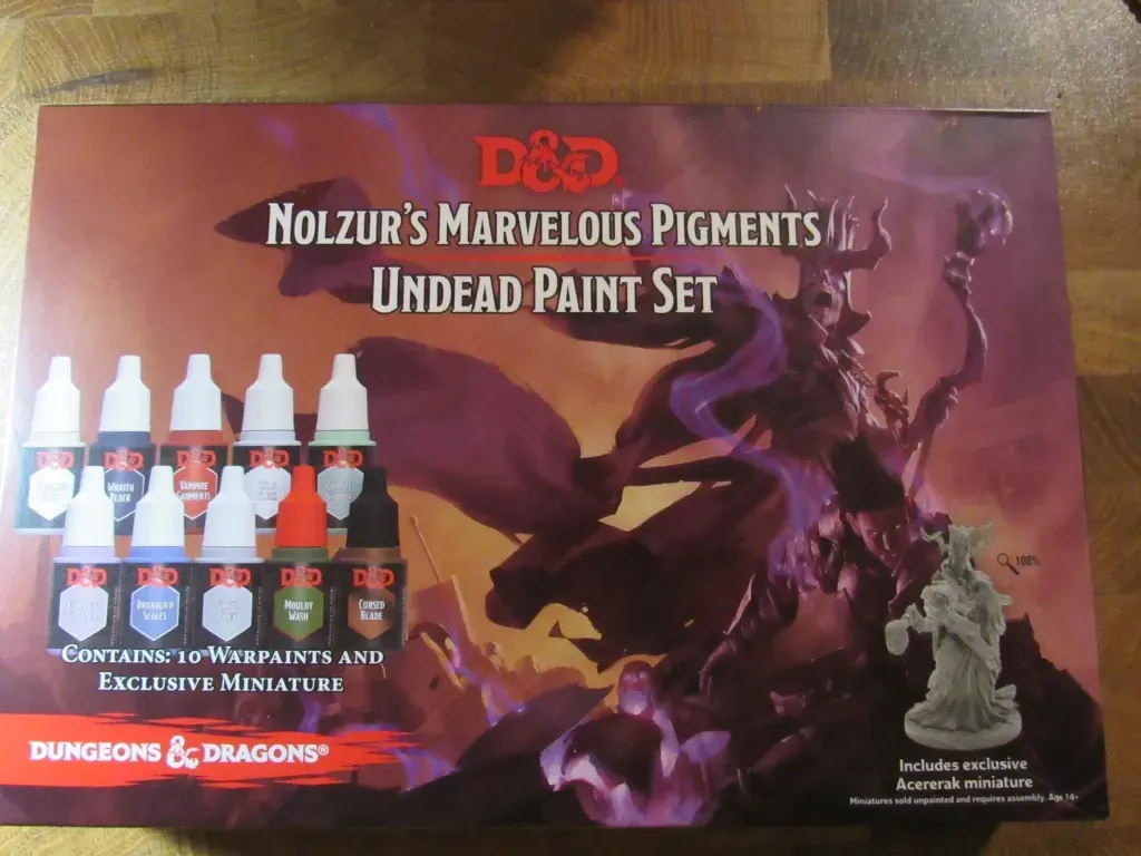 D&D Nolzur's Marvelous Pigments Undead Paint Set. Box includes paint bottles and an undead miniature.