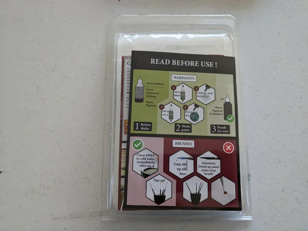 Clear plastic package containing a product instruction sheet.