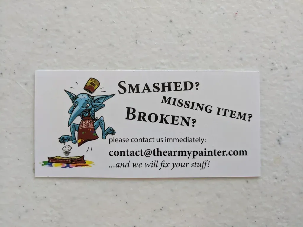 A card from The Army Painter. It features a goblin with text:
