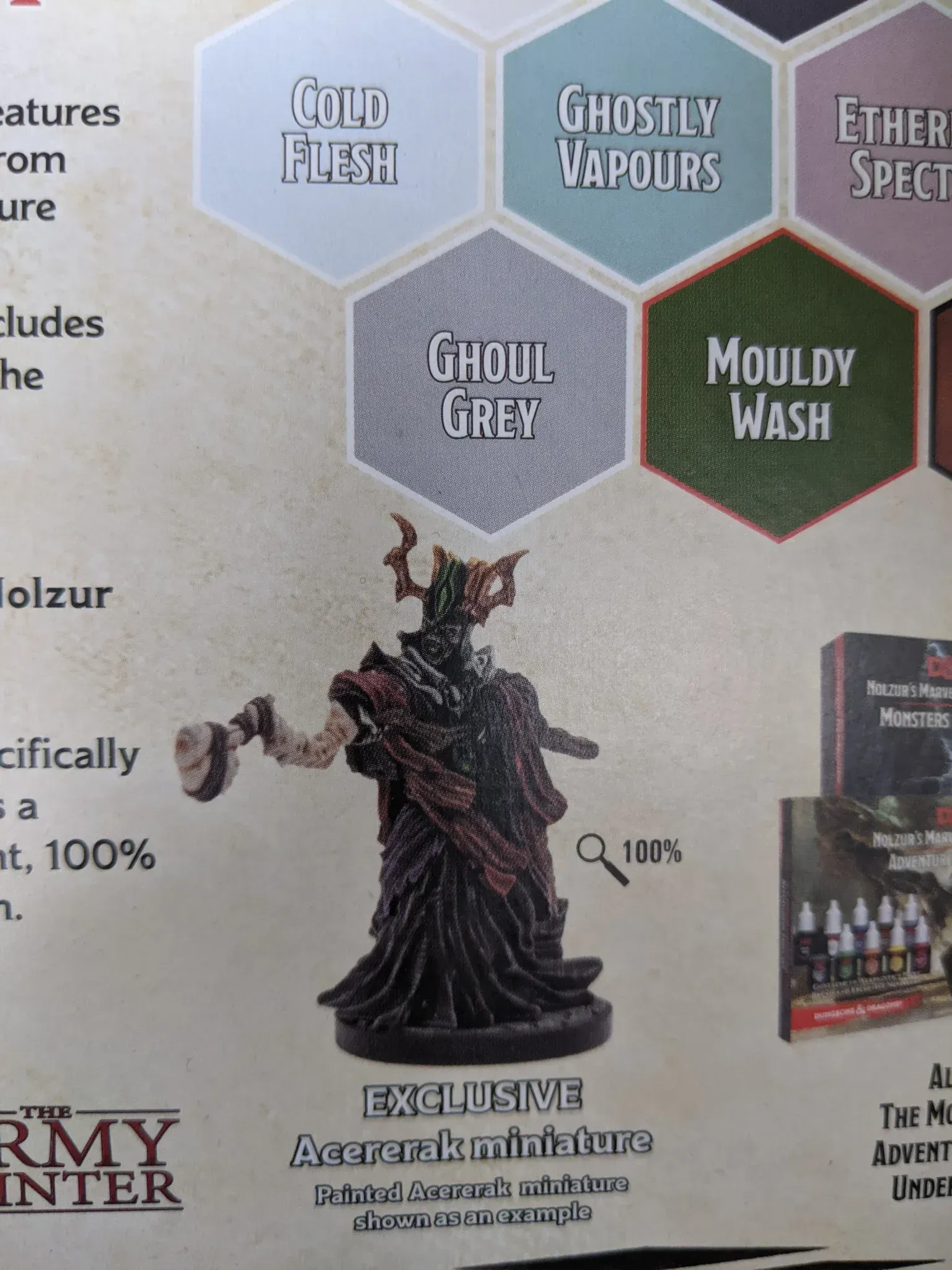 Miniature of a dark robed figure with a hammer, near paint color swatches, labeled “Ghoul Grey” and “Mouldy Wash”.