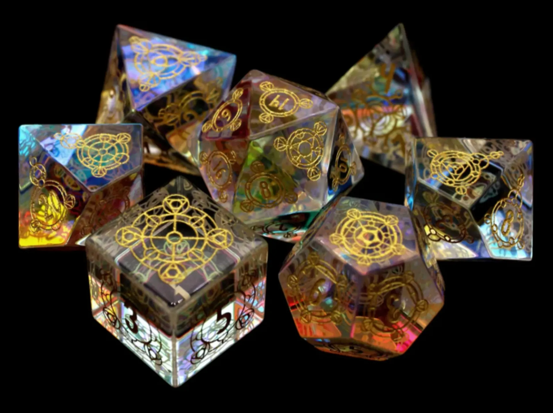 Set of ornate, iridescent dice in various geometric shapes; gold detailing on a black background.