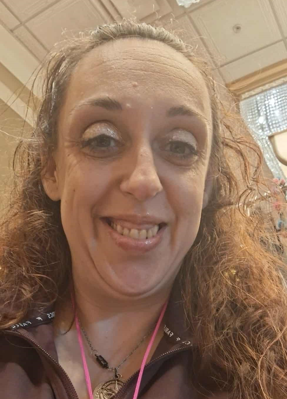 A logo for springmysteries.com with a pentagram and crescent moons