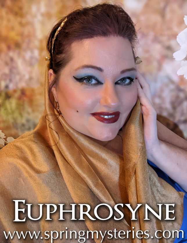 A woman with a gold scarf around her head and the website euphrosyne www.springmysteries.com