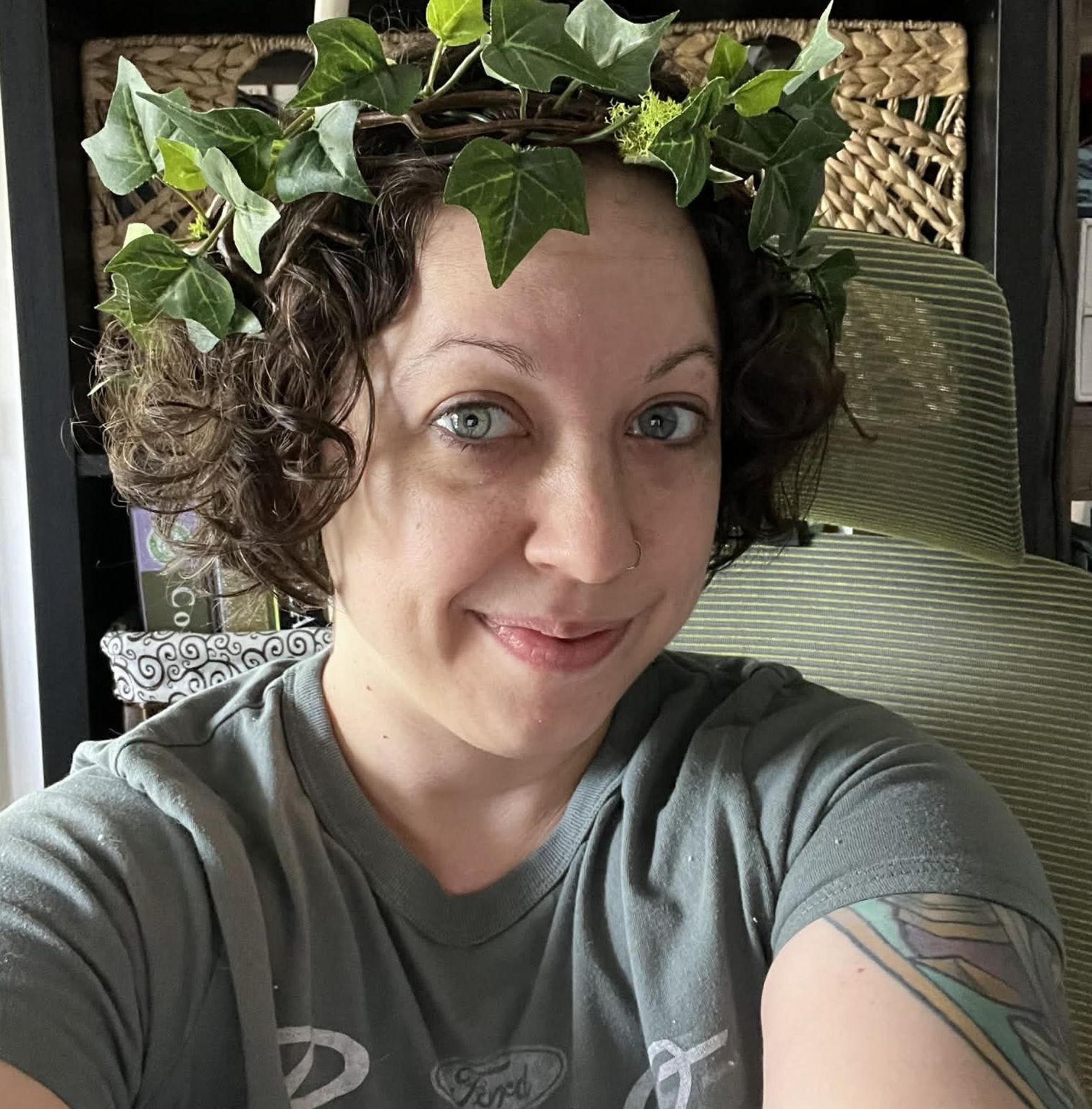 A woman wearing a choker with the letter s on it, Tasha Zebrowan.
