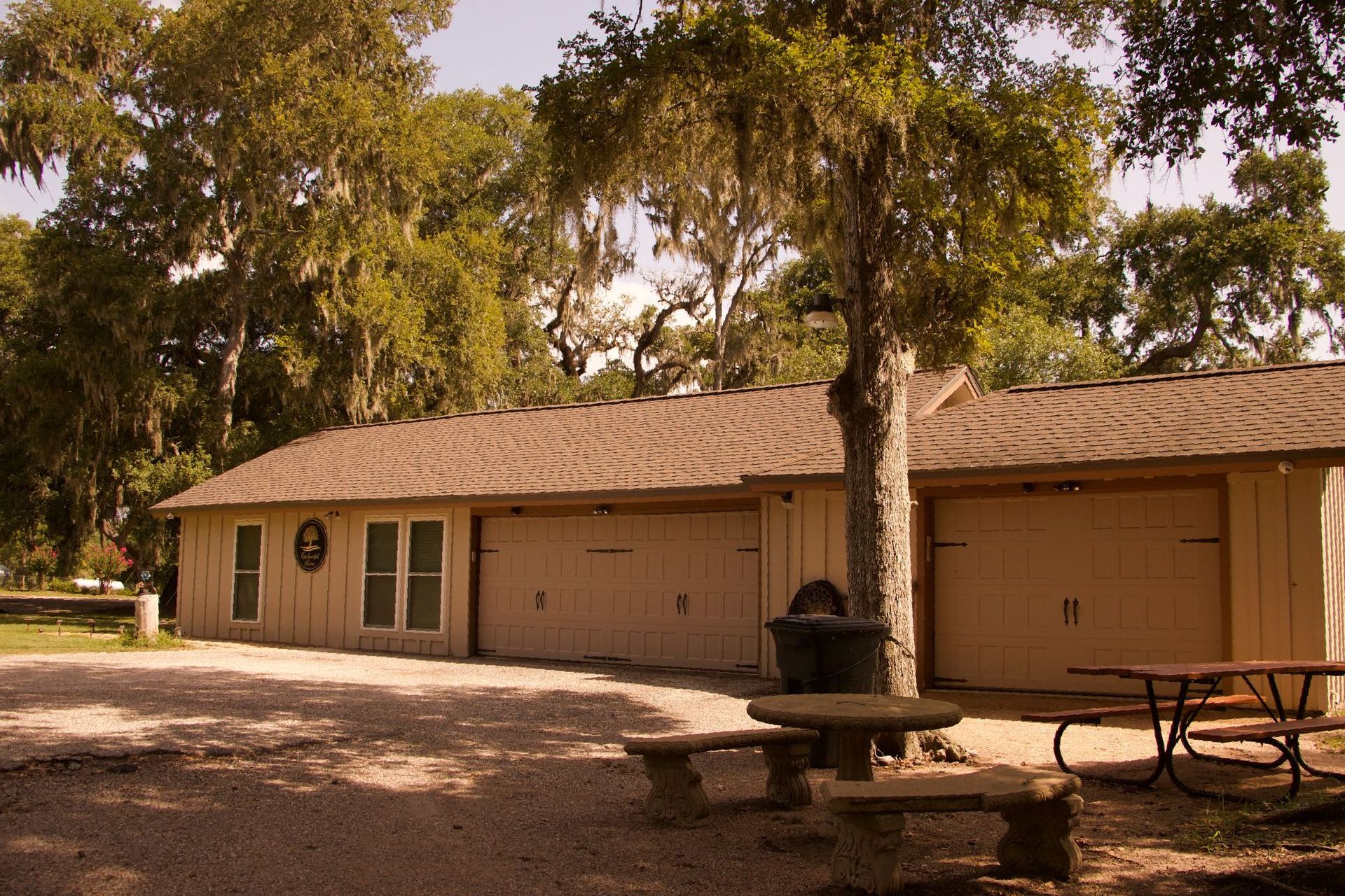 a house with a picnic table in front of it