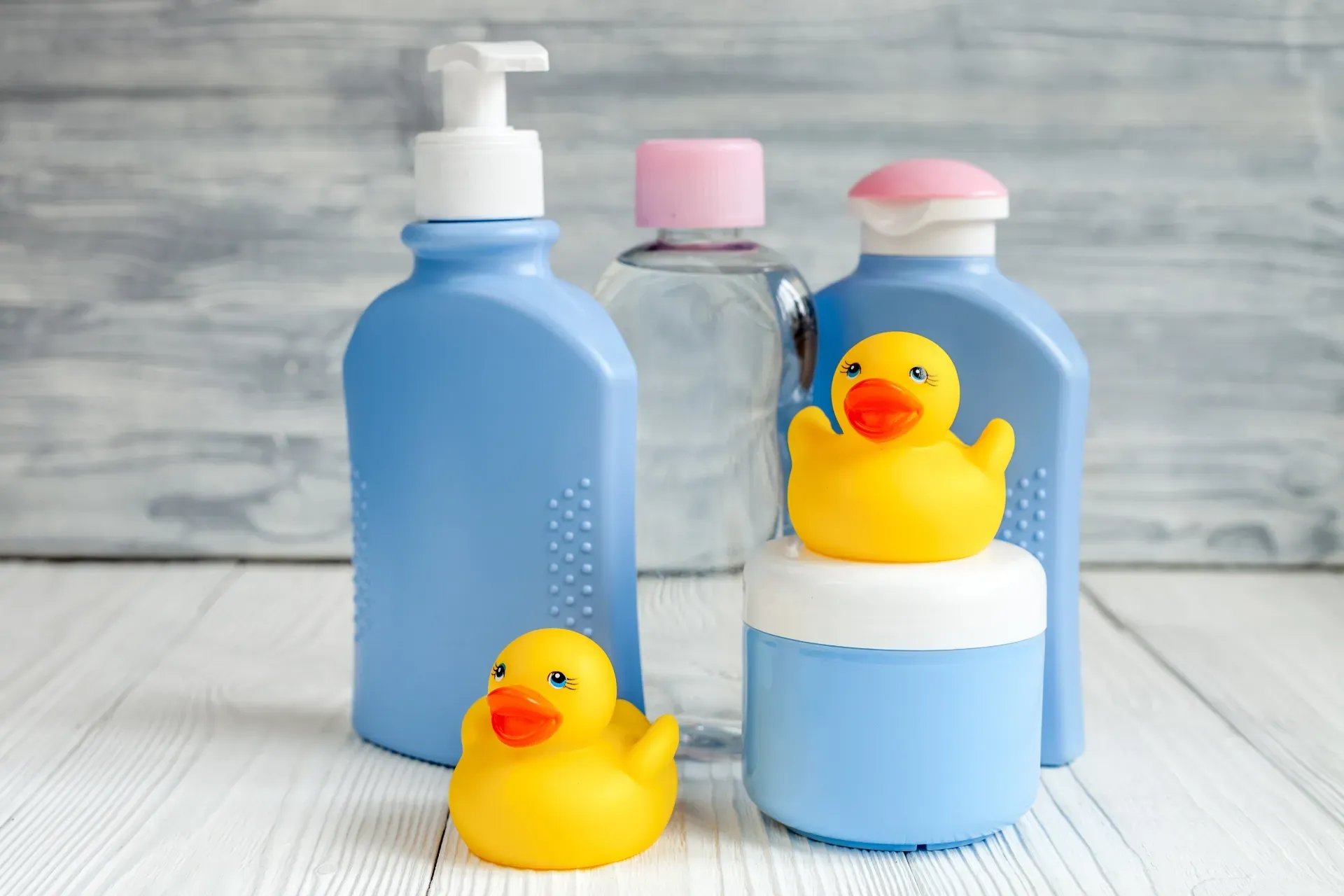 blue baby bottles and yellow duck