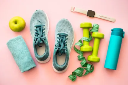exercise shoes and dumbells, water bottle