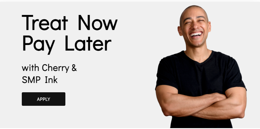 A man is standing with his arms crossed in front of a sign that says treat now pay later.