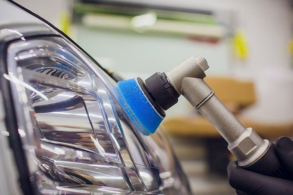 Auto Mechanic Buffing and Polishing Car Headlight — Issaquah, WA — David’s Auto Detailing
