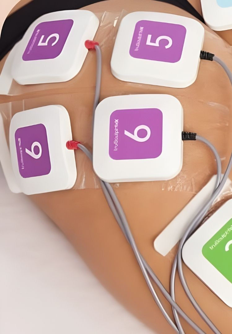 Medical training torso with electrode pads and wires attached for CPR/defibrillator practice