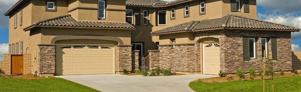 For garage conversions in Plymouth call Hocking Garage Conversions Large beige mansion