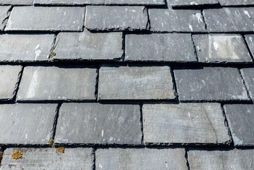 A Close Up Of A Roof Made Of Slate Tiles — Pittsfield, MA — ML Contracting