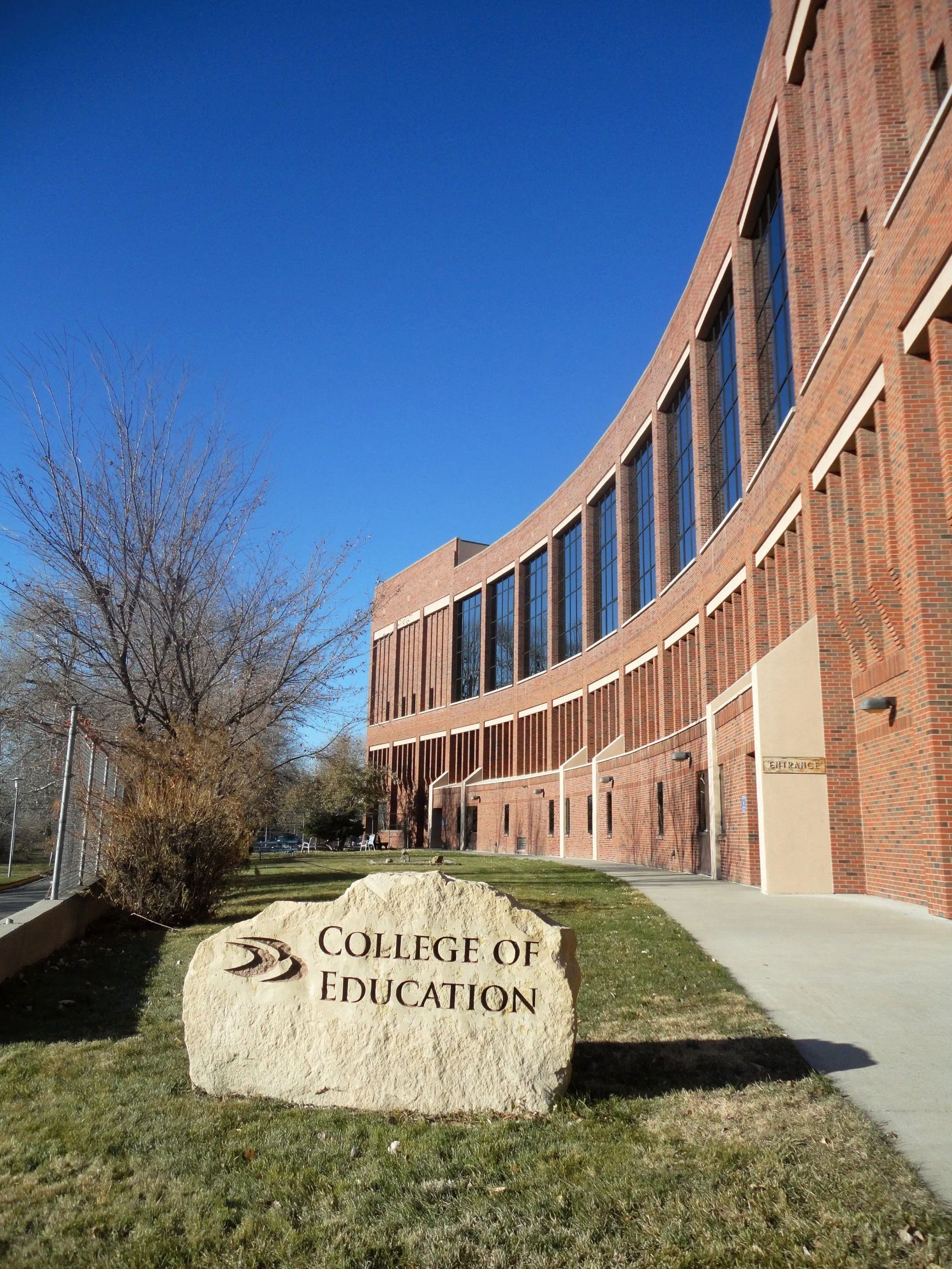 Building with a stone marker reading 