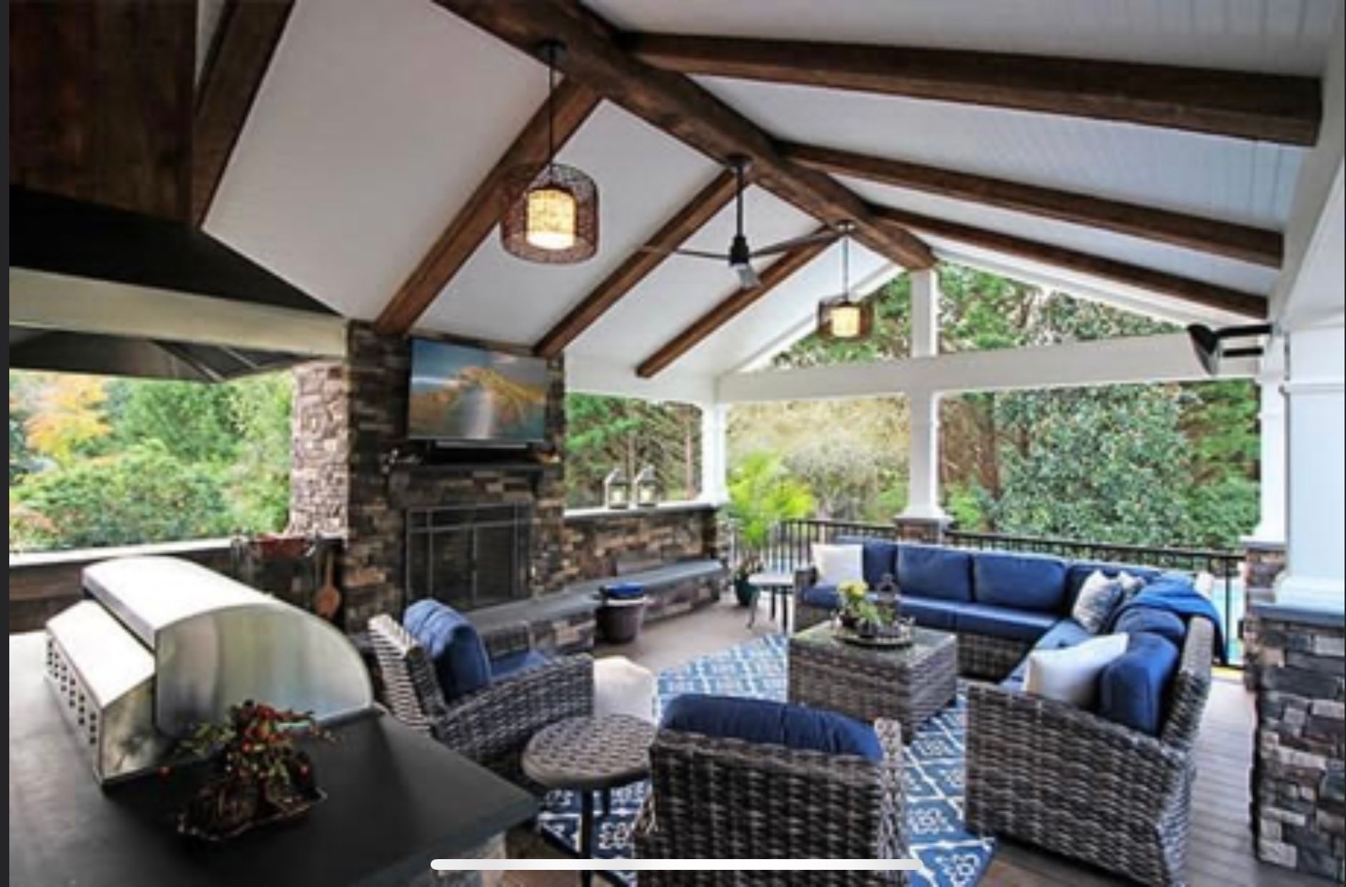 Remodeling Experts deck builder contractor custom deck with custom porch with fireplace