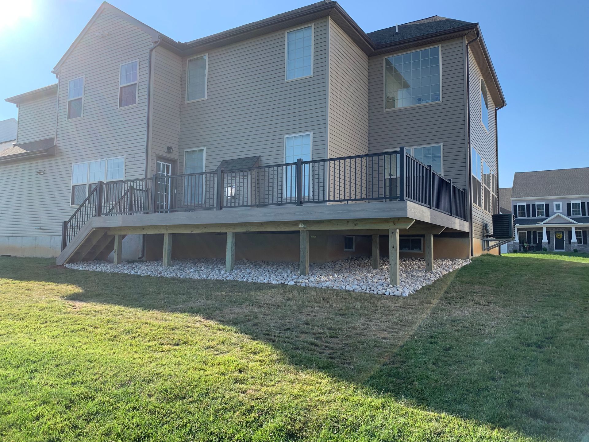 Remodeling Experts deck builder contractor custom maintenance free composite decking with aluminum railing