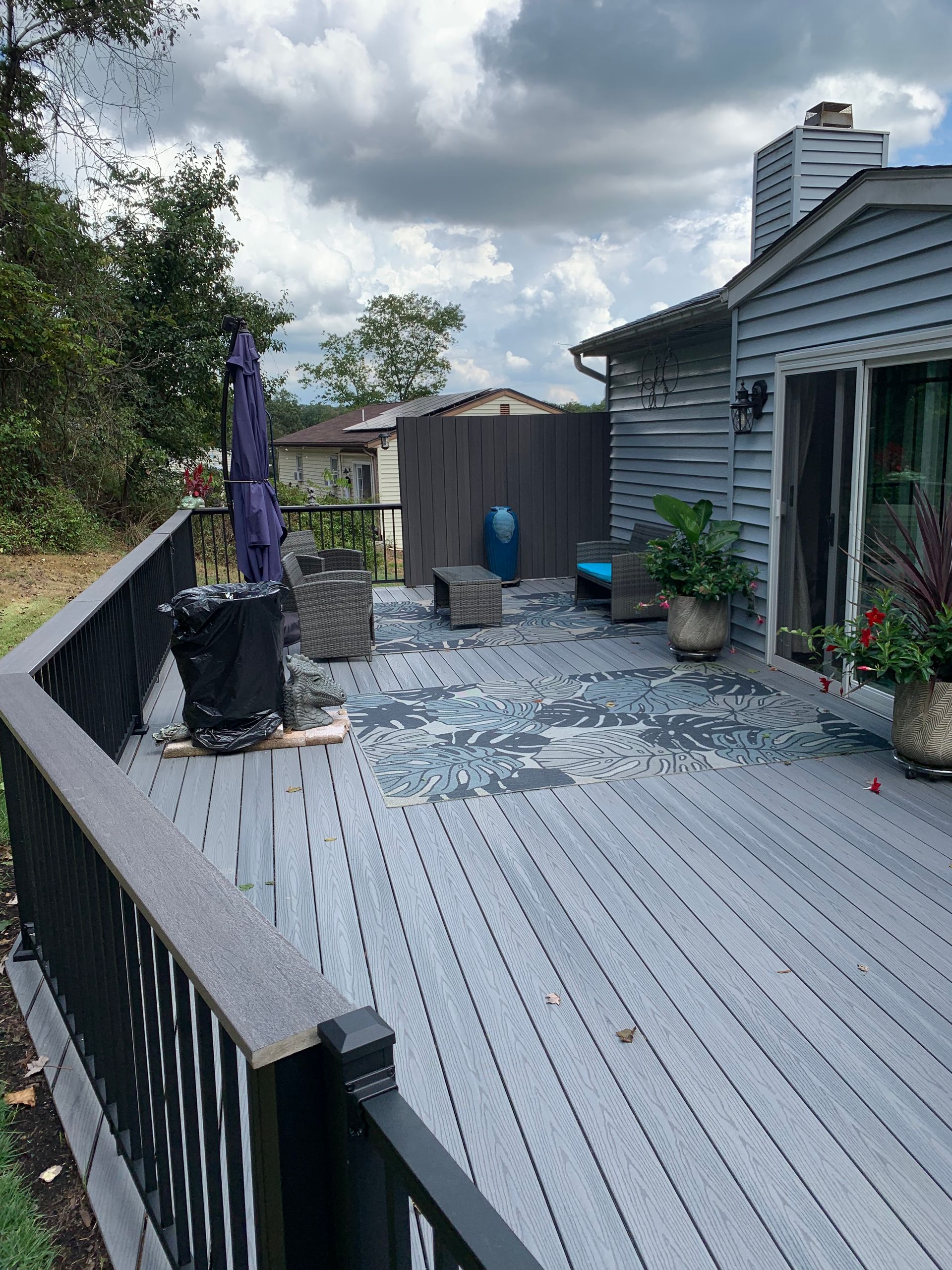 Remodeling Experts deck builder contractor custom deck along pool. Deck details... maintenance free composite decking with aluminum railing 