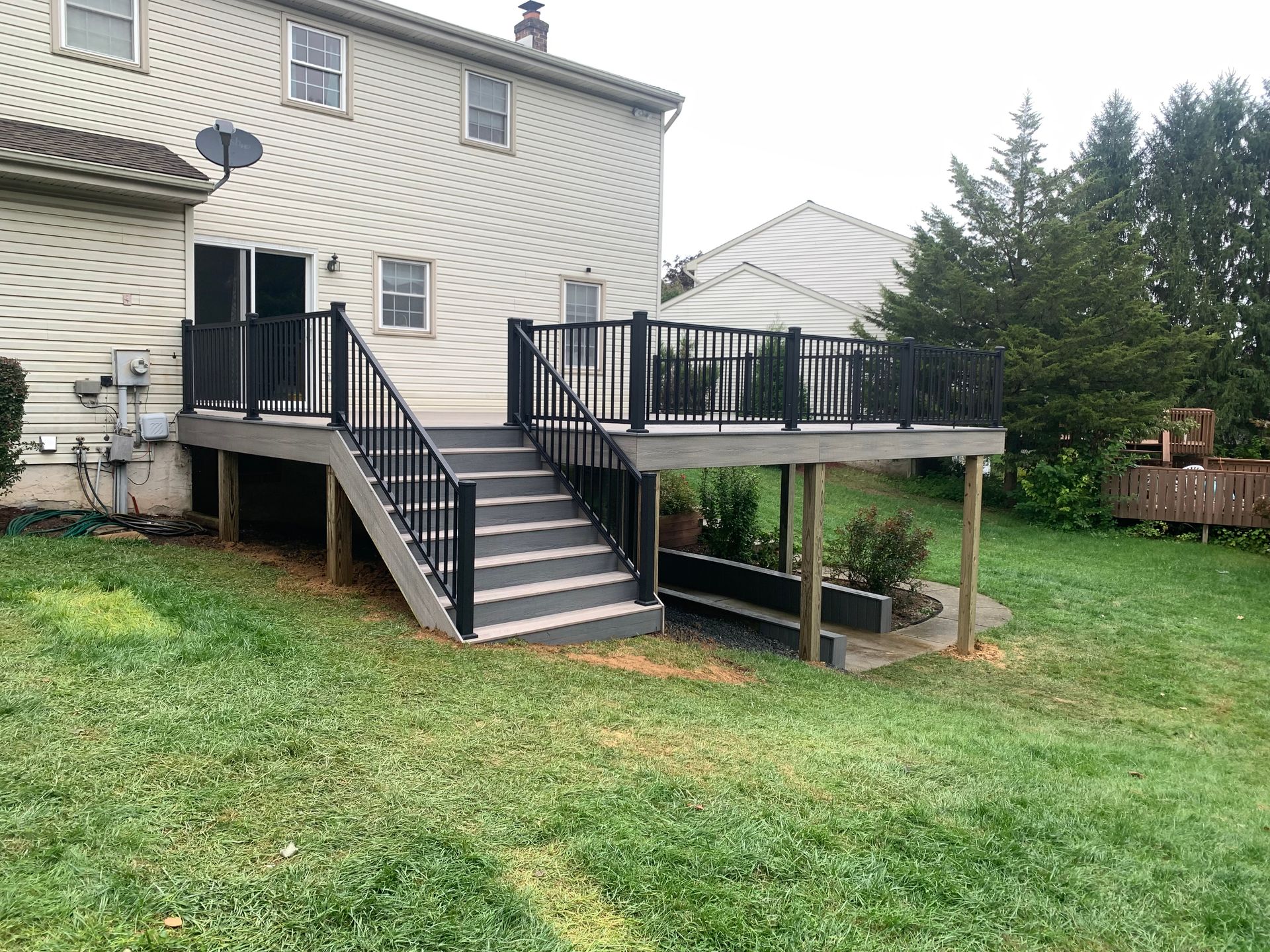 Remodeling Experts deck builder contractor custom deck along pool. Deck details... maintenance free composite decking with aluminum railing 