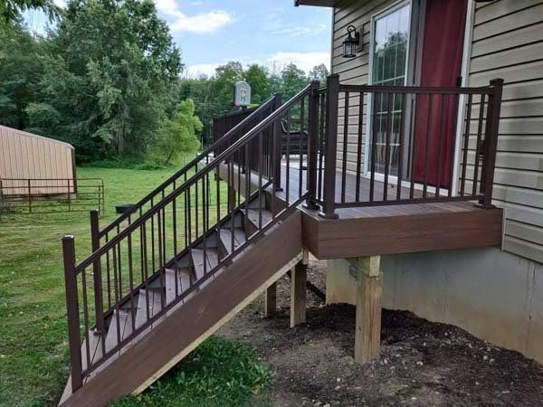 Remodeling Experts deck builder contractor custom deck along pool. Deck details... maintenance free composite decking with aluminum railing 