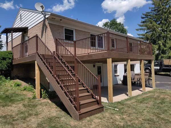 Remodeling Experts deck builder contractor custom deck along pool. Deck details... maintenance free composite decking with aluminum railing 