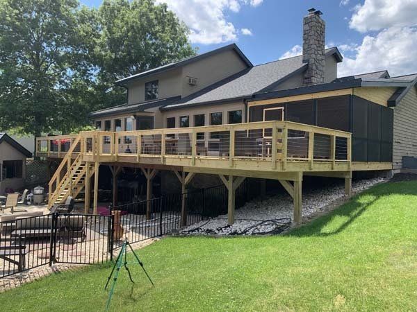 Remodeling Experts deck builder contractor custom wood deck with cable railing