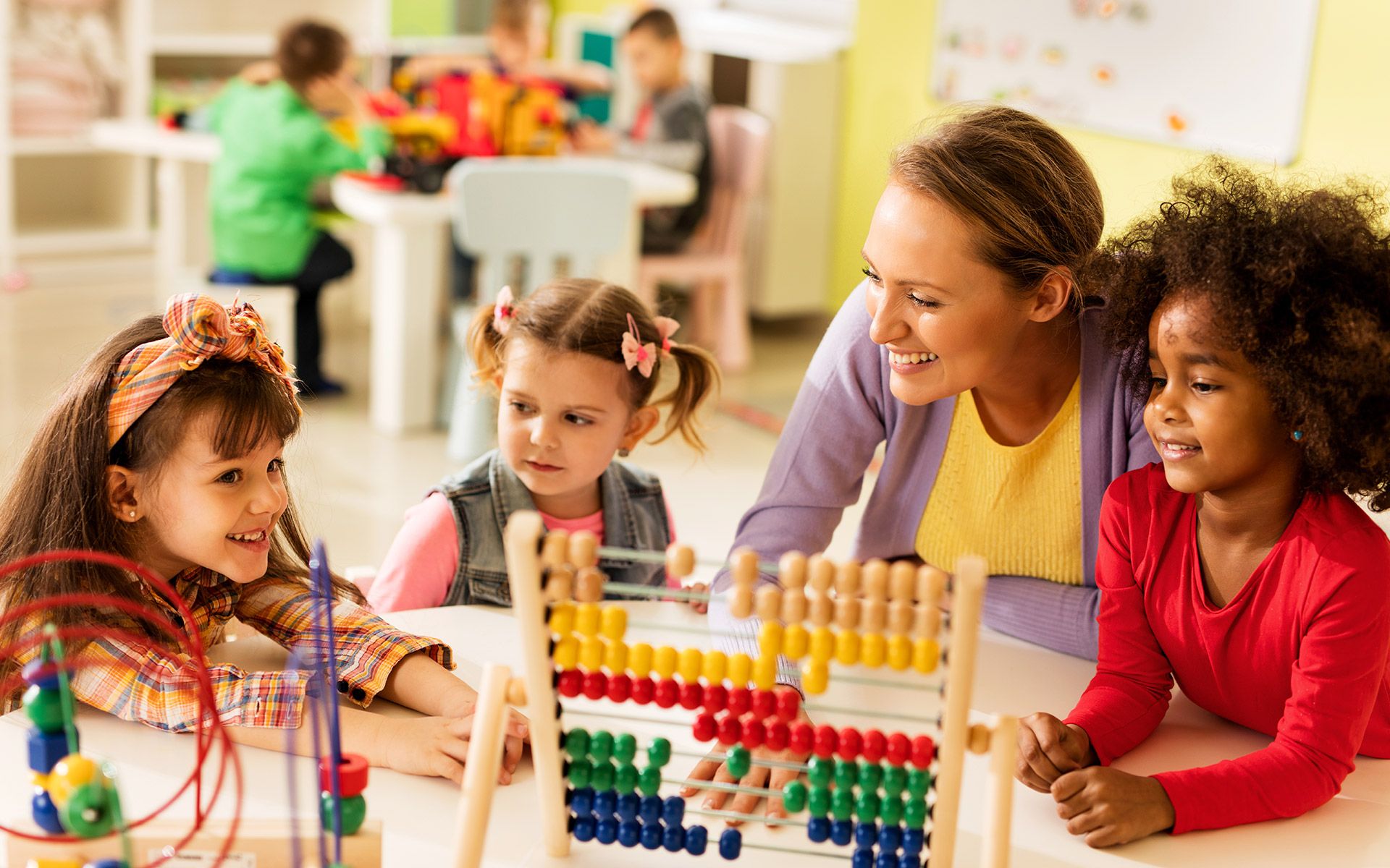 Three Kids And Teacher — Newnan, GA — Chroma Early Learning Academy
