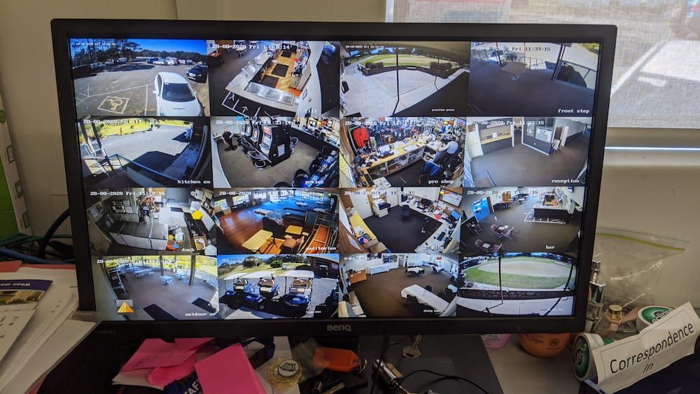 A Monitor With a Lot of Pictures on It is Sitting on a Desk — Inspired Audio Visual in Coffs Harbour, NSW