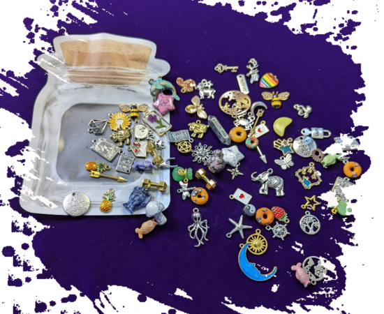 A bag with lots of charms around it, a wide variety