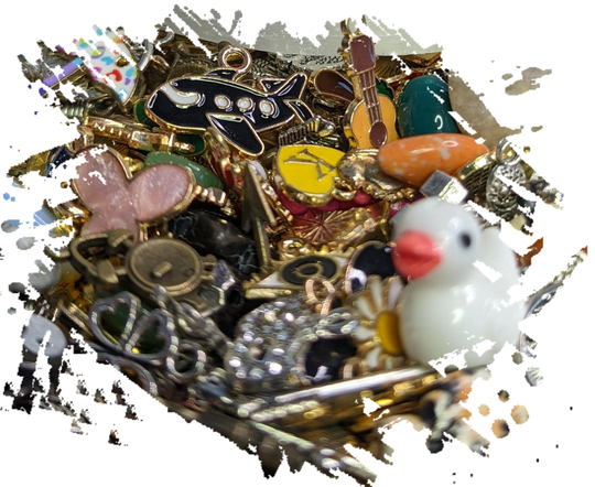 A bag with lots of charms around it, a wide variety