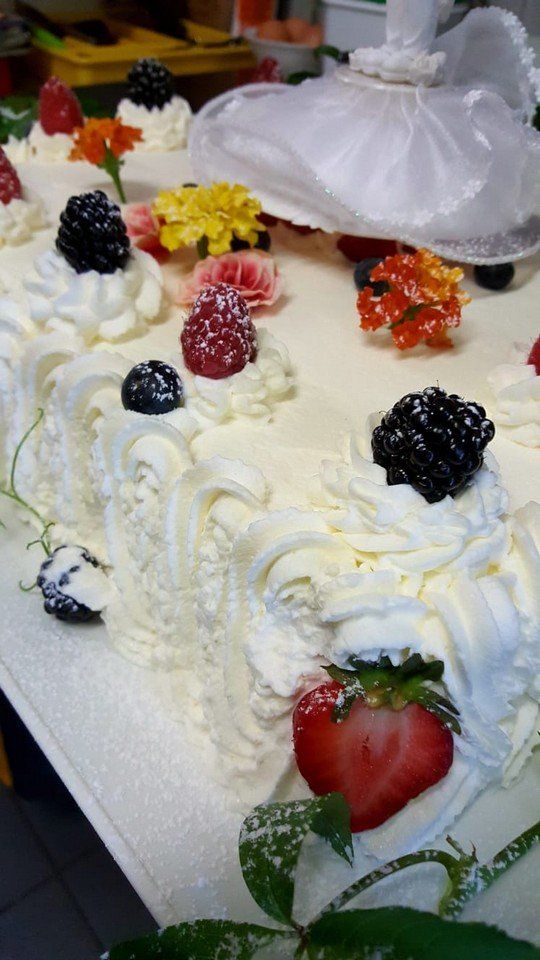 cake with cream and strawberries