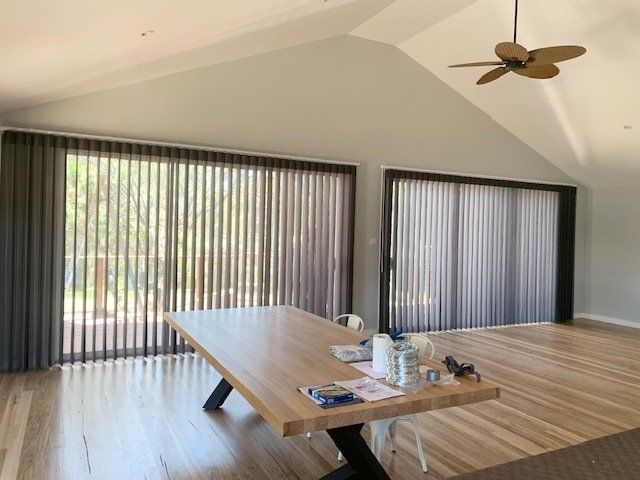Interior Photography Of Neutral Toned Bedroom With White Bedding — Co-ordinations Blinds & Awnings in Falls Creek, NSW