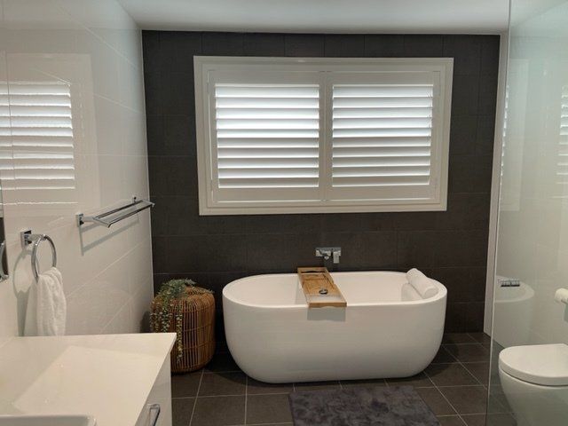 Window With Blind, Exterior Shot — Co-ordinations Blinds & Awnings in Falls Creek, NSW
